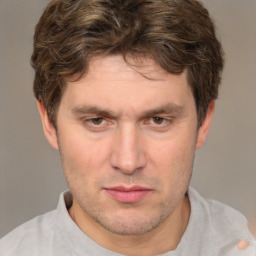 Neutral white adult male with short  brown hair and brown eyes