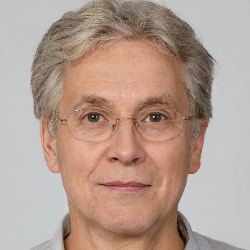 Joyful white middle-aged male with short  gray hair and brown eyes