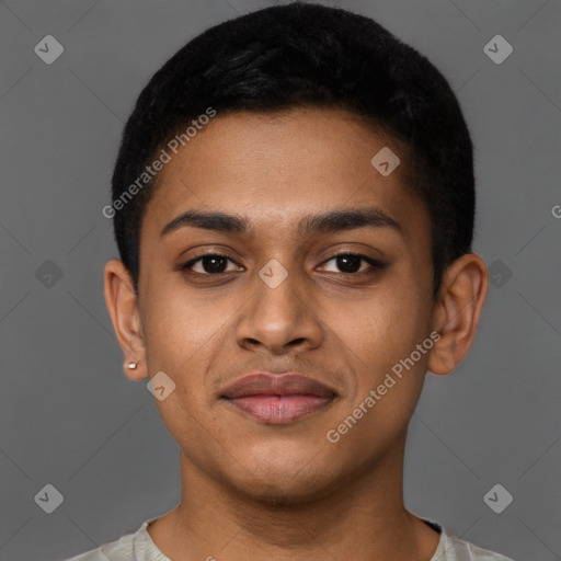 Joyful latino young-adult male with short  brown hair and brown eyes