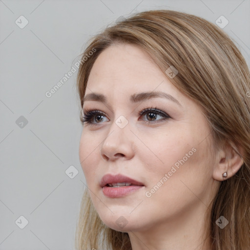 Neutral white young-adult female with long  brown hair and brown eyes