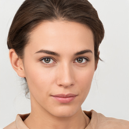 Neutral white young-adult female with medium  brown hair and brown eyes