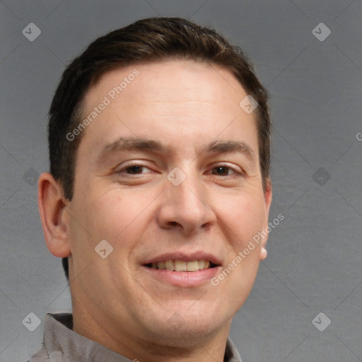 Joyful white adult male with short  brown hair and brown eyes