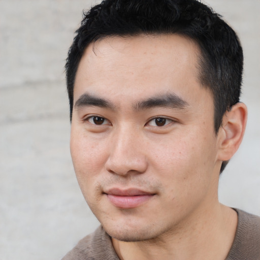Neutral asian young-adult male with short  black hair and brown eyes
