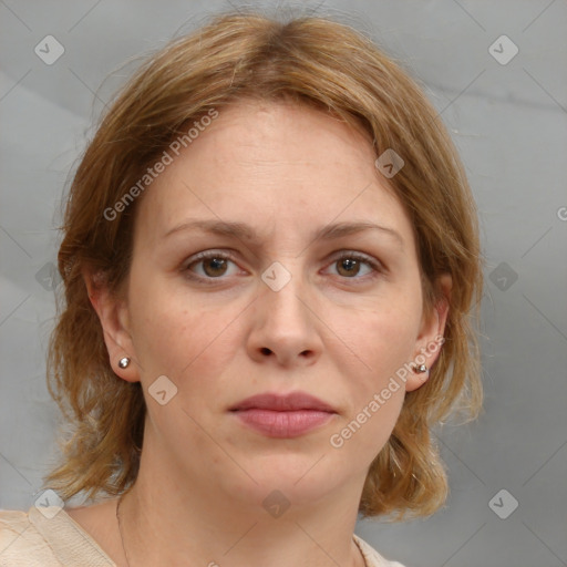 Joyful white adult female with medium  brown hair and grey eyes