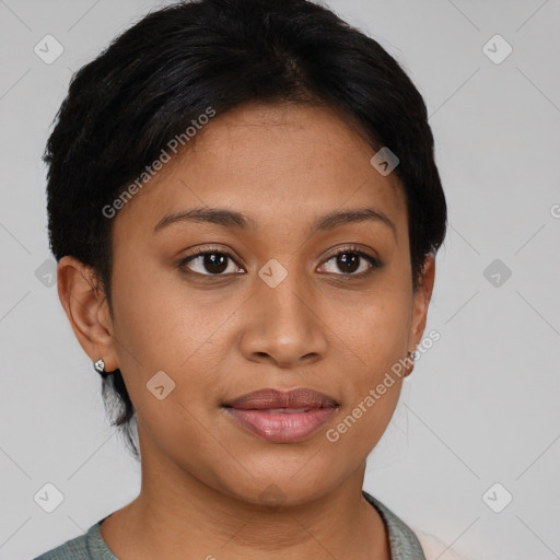 Joyful latino young-adult female with short  brown hair and brown eyes