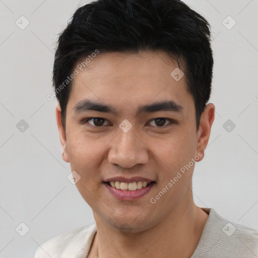 Joyful latino young-adult male with short  black hair and brown eyes