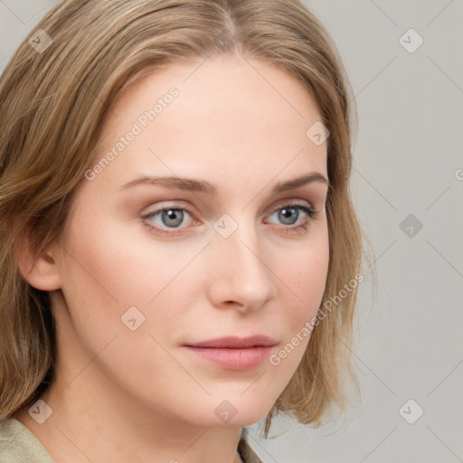 Neutral white young-adult female with long  brown hair and blue eyes