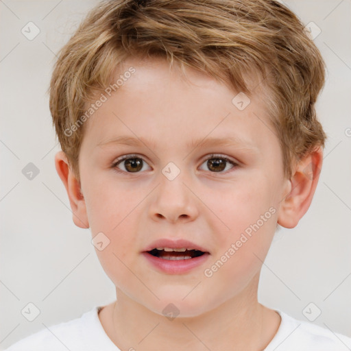 Joyful white child male with short  brown hair and brown eyes