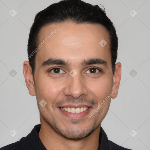 Joyful white young-adult male with short  black hair and brown eyes