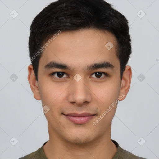 Joyful asian young-adult male with short  brown hair and brown eyes