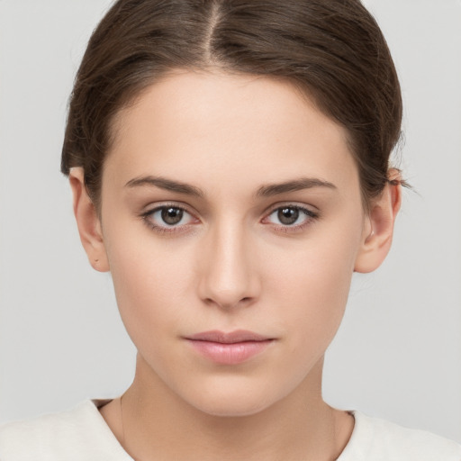 Neutral white young-adult female with short  brown hair and brown eyes