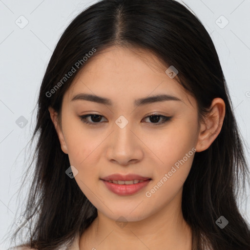 Joyful asian young-adult female with long  brown hair and brown eyes