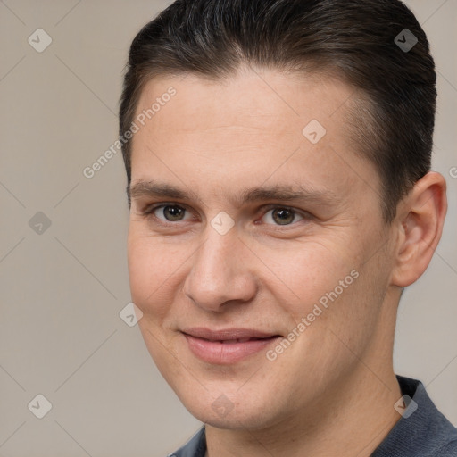 Joyful white young-adult male with short  brown hair and brown eyes