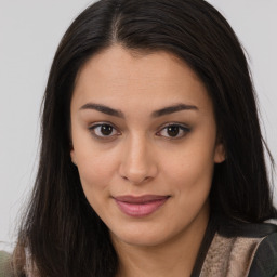 Joyful asian young-adult female with long  brown hair and brown eyes