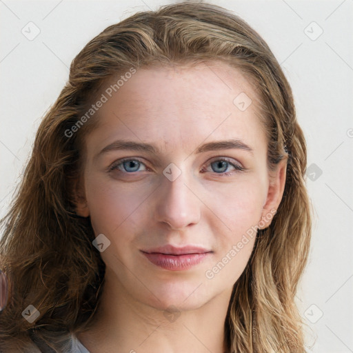 Joyful white young-adult female with long  brown hair and blue eyes