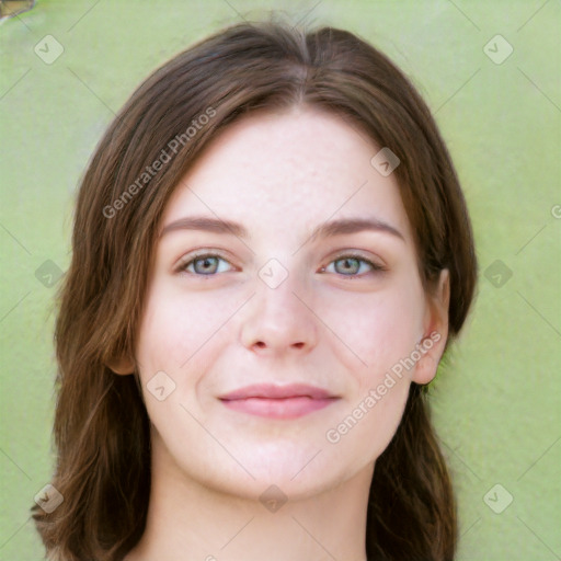 Joyful white young-adult female with long  brown hair and green eyes