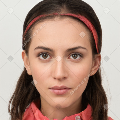 Neutral white young-adult female with long  brown hair and brown eyes