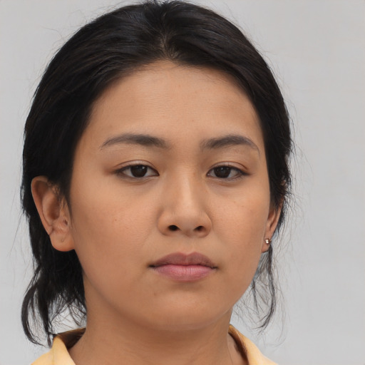 Neutral asian young-adult female with medium  brown hair and brown eyes