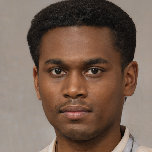 Neutral black young-adult male with short  brown hair and brown eyes