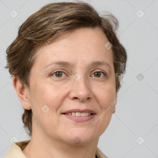 Joyful white adult female with medium  brown hair and grey eyes