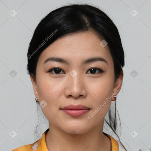 Joyful asian young-adult female with medium  black hair and brown eyes