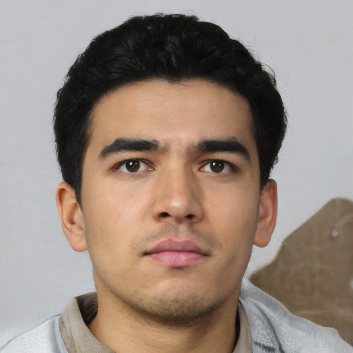 Neutral asian young-adult male with short  black hair and brown eyes