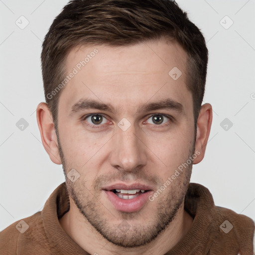 Joyful white young-adult male with short  brown hair and brown eyes