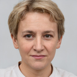 Joyful white adult male with short  brown hair and grey eyes