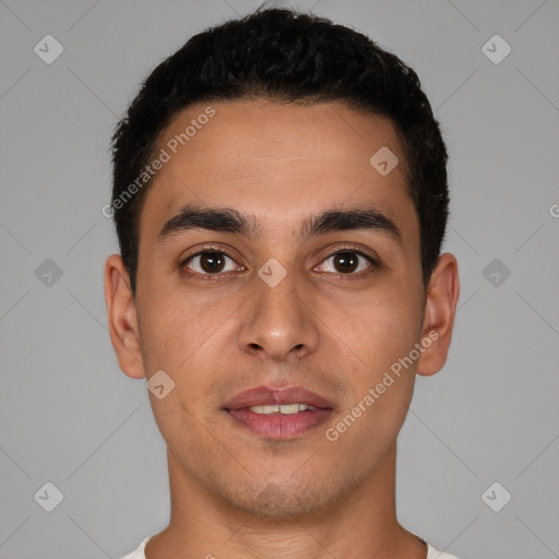 Joyful white young-adult male with short  black hair and brown eyes