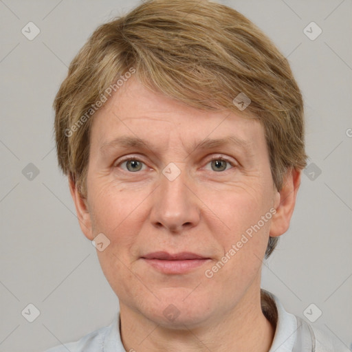 Joyful white adult male with short  brown hair and grey eyes