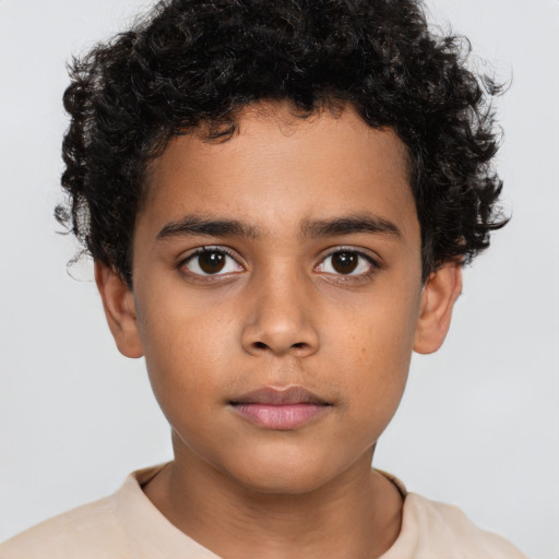 Neutral latino child male with short  brown hair and brown eyes