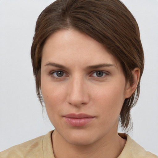 Neutral white young-adult female with medium  brown hair and grey eyes