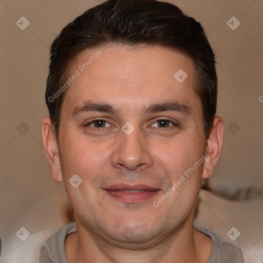 Joyful white adult male with short  brown hair and brown eyes