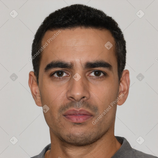 Neutral latino young-adult male with short  black hair and brown eyes