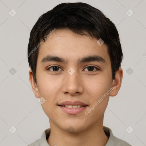 Joyful white young-adult male with short  black hair and brown eyes