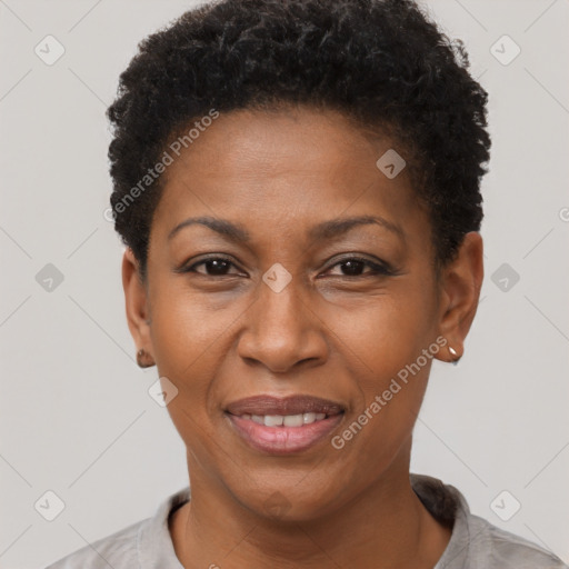 Joyful black adult female with short  brown hair and brown eyes