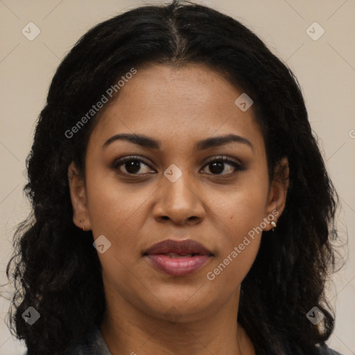 Joyful black young-adult female with long  brown hair and brown eyes