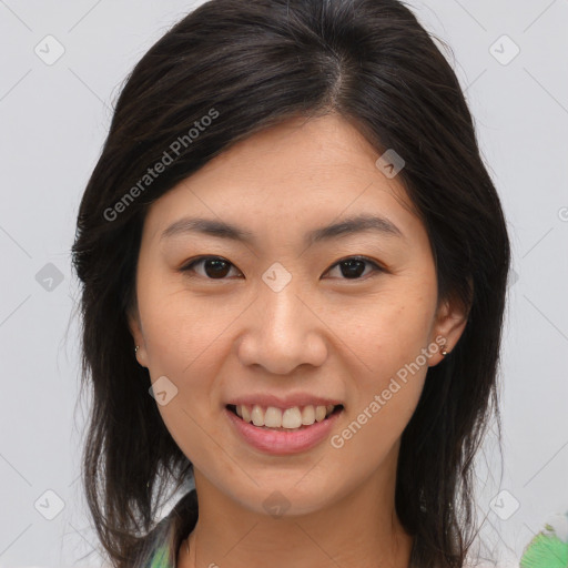 Joyful asian young-adult female with medium  brown hair and brown eyes