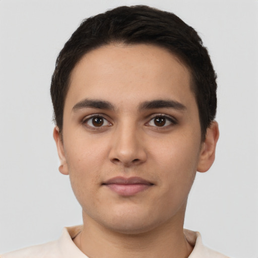 Neutral latino young-adult male with short  black hair and brown eyes