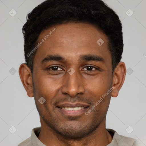 Joyful latino young-adult male with short  black hair and brown eyes