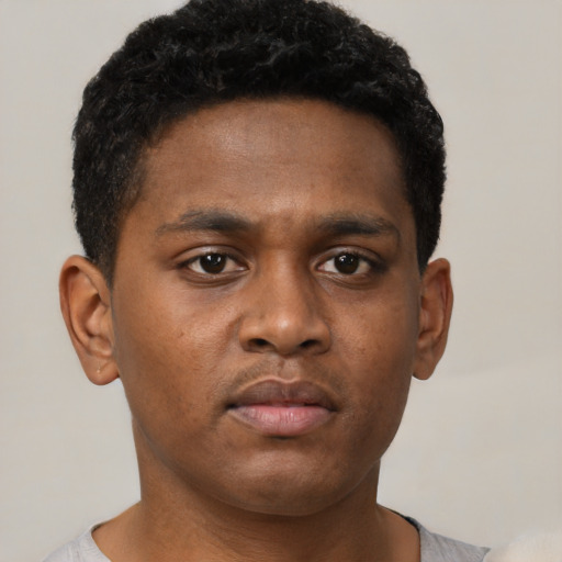 Neutral black young-adult male with short  brown hair and brown eyes