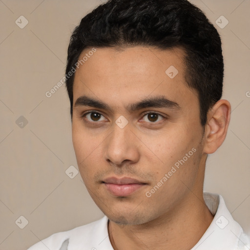 Neutral white young-adult male with short  black hair and brown eyes