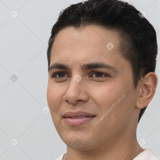 Joyful white young-adult male with short  brown hair and brown eyes