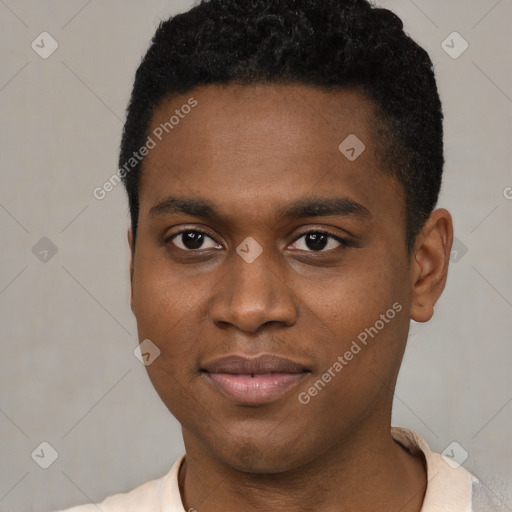 Joyful black young-adult male with short  brown hair and brown eyes