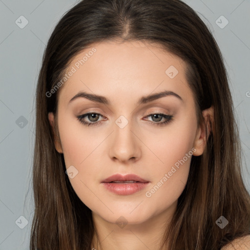 Neutral white young-adult female with long  brown hair and brown eyes