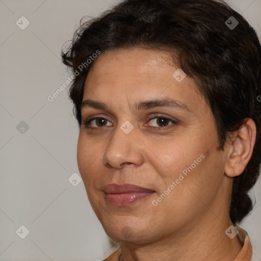 Joyful white adult female with short  brown hair and brown eyes