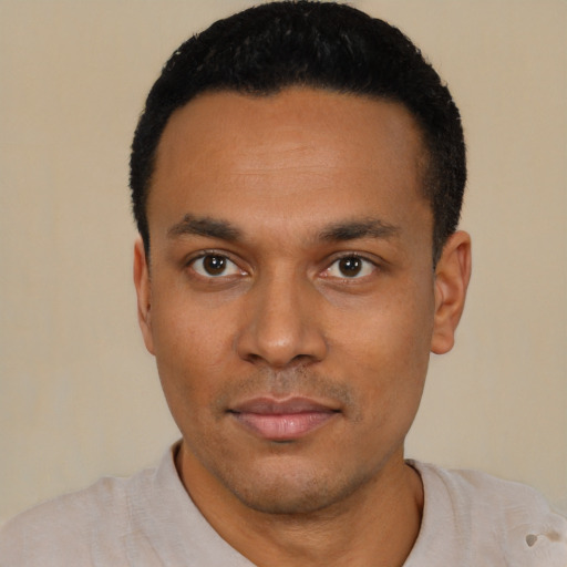 Neutral latino young-adult male with short  black hair and brown eyes