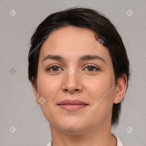 Joyful white young-adult female with medium  brown hair and brown eyes