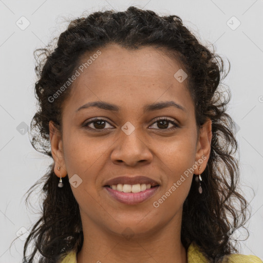 Joyful black young-adult female with long  brown hair and brown eyes