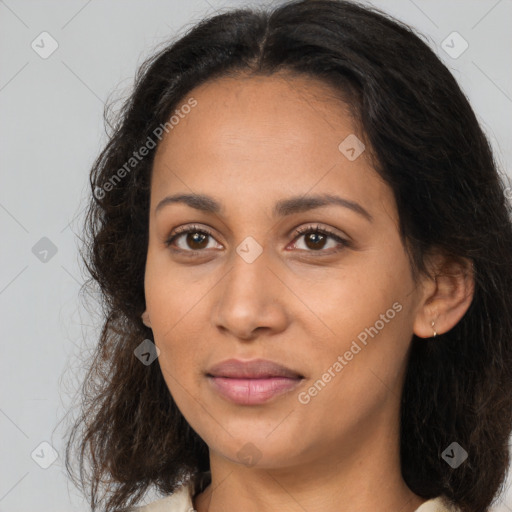 Joyful latino young-adult female with long  brown hair and brown eyes